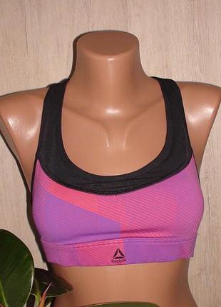 Спортивний топік  reebok з гарною спинкою.