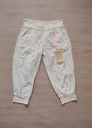 Шорти. шорти на резинці.білі шорти. 40. l. бріджи.