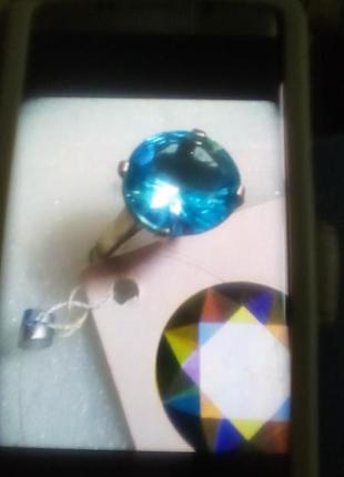 Словне кільце, срібло925 проби з блакитним цирконом👍