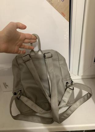 Кожаный рюкзак маленький с шипами2 фото