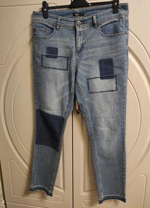 Женские джинсы зауженные к низу р.52/eur441 фото