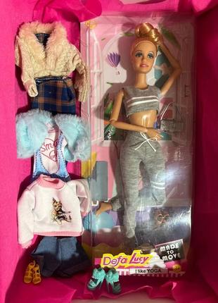 Набір лялька з одягом та взуттям для ляльок типу барбі1 фото