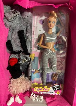 Набір лялька з одягом та взуттям для ляльок типу барбі1 фото