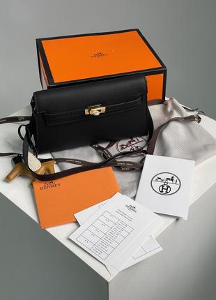 Hermes kelly pochette black/gold