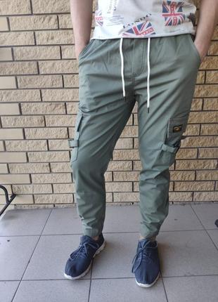 Джоггеры, джинси з поясом на резинці унісекс, накладні кишені карго nn дм 1178(8011)6 фото