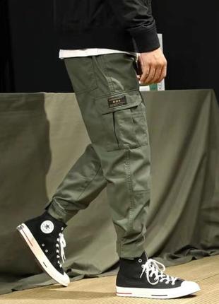 Джоггеры, джинси з поясом на резинці унісекс, накладні кишені карго nn дм 1179-1(892)