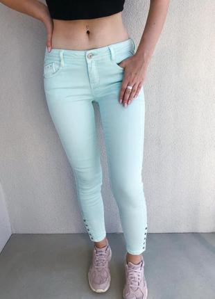 Светлые мятные джинсы1 фото