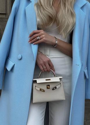 Жіноче блакитне пальто2 фото