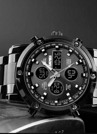 Чоловічий наручний годинник skmei molot чорний з чорним циферблатом4 фото