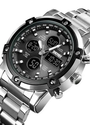 Чоловічий наручний годинник skmei molot срібний з чорним циферблатом1 фото