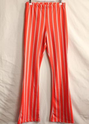 Обтягивающие штаны клёш в полоску