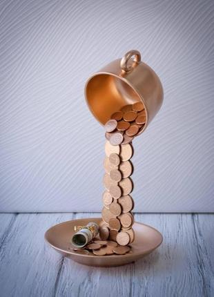 Сувенир статуэтка парящая чашка с золотым напылением и монетами ручная работа хенд мейд подарок1 фото