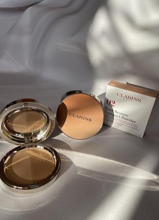 Скульптор ever bronze compact powder от clarins2 фото