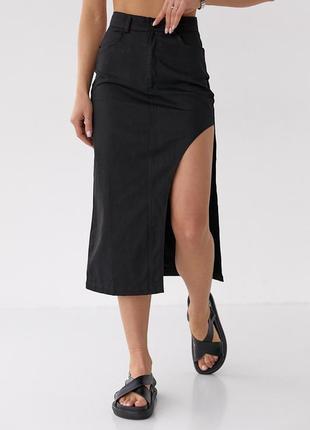 Женская черная асимметричная коттоновая юбка миди с полукруглым разрезом2 фото