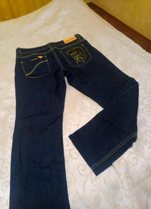 Фирменные джинсы на мальчика в новом состоянии2 фото