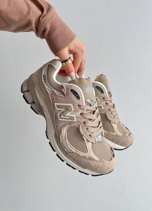 Стильные женские и мужские кроссовки new balance 2002r protection pack driftwood коричневые