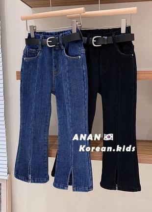 Стильные джинсы с разрезами клеш стрейч