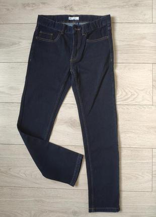 Синие джинсы 10-12 лет1 фото