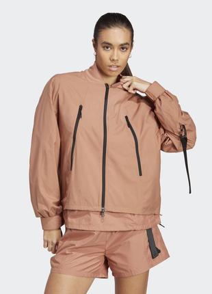 Куртка-вітрівка жіноча adidas city escape loose track top ia21361 фото