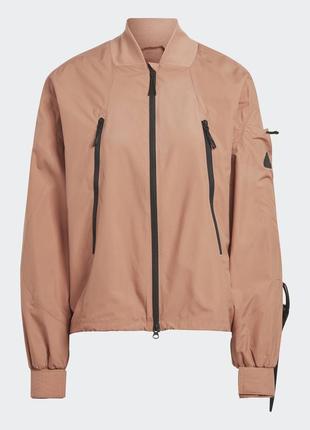 Куртка-вітрівка жіноча adidas city escape loose track top ia21366 фото