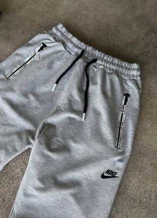 Мужские серые спортивные штаны мужские спортивные трикотажные брюки nike3 фото