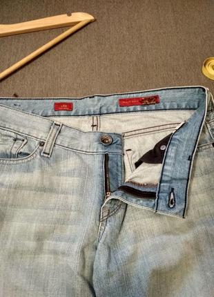 Жіночі модні блакитні джинси з потертостями denim сша, нові, розмір 31w2 фото