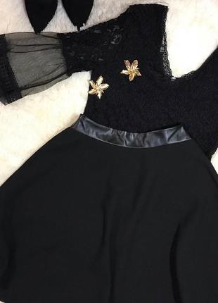 Черная юбка клеш