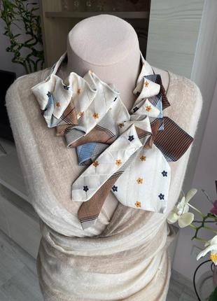 Женское украшение из галстуков4 фото