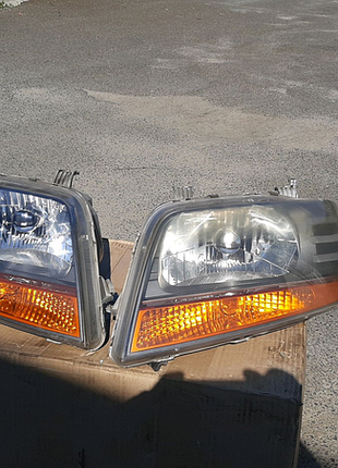 Фара передня chevrolet aveo т200