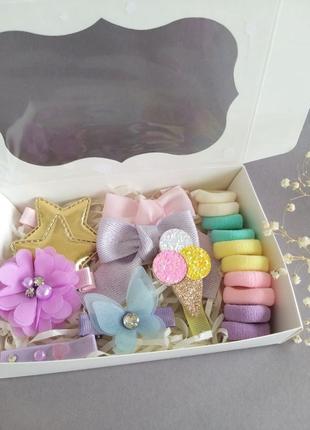 Заколки и резинки для волосся