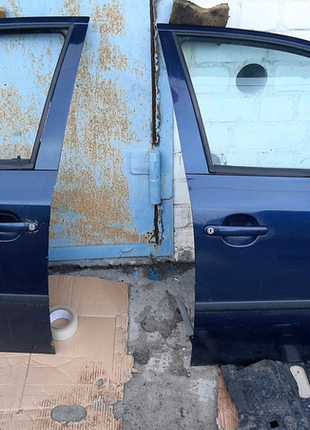 Двері передня ліва skoda octavia tour