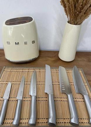 Набір ножів smeg з підставкою (7 предметів)5 фото