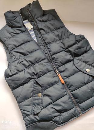 Женская жилетка