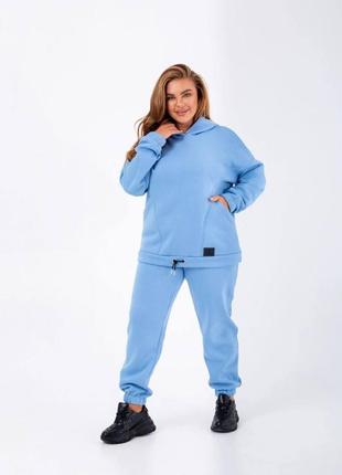 Стильний жіночий спортивний костюм блакитного кольору 25373 n 46/48