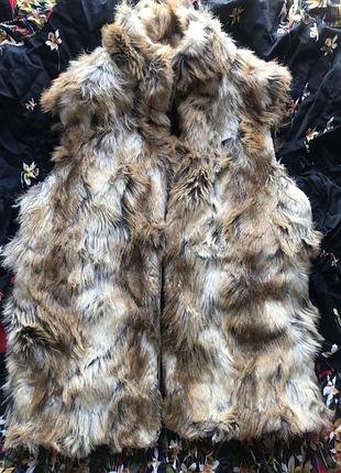 Меховая жилетка