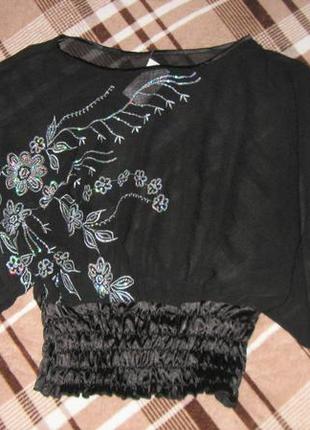 Нарядная блуза "летучая мышь" с рисунком из пайеток5 фото