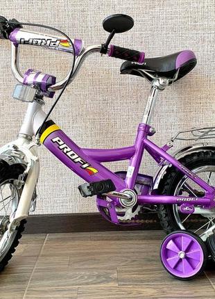 Велосипед profi trike 12д (p1248a) фіолетовий з додатковими колес