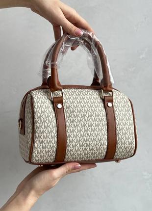 Жіноча сумка michael kors speedy beige brown4 фото