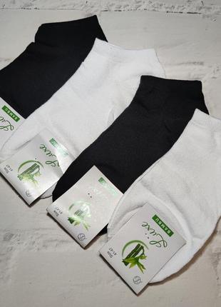 Чоловічі шкарпетки (чорні, білі)2 фото