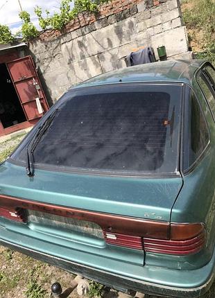 Кришка багажника (ляда) зі склом для mitsubishi galant 1990 р.в. хетчбек.