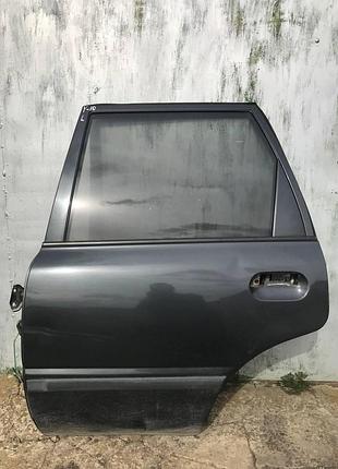 Двері задні ліві для nissan sunny y-10. универсал.