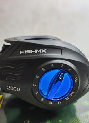 Катушка мультипликаторная fismnx 2000  для правой и левой руки спиннинга рыбалки8 фото