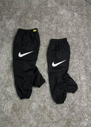 Nike nylon pants side swoosh