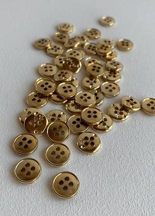 Ґудзик сорочковий бортик 4отв золотий 13мм пластик