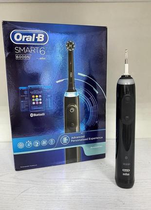 Б/у электрическая зубная щетка oral-b1 фото