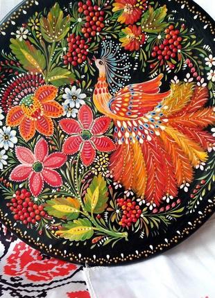 Декоративная деревянная тарелка "красуня", авторская ручная роспись. петриковская роспись.2 фото