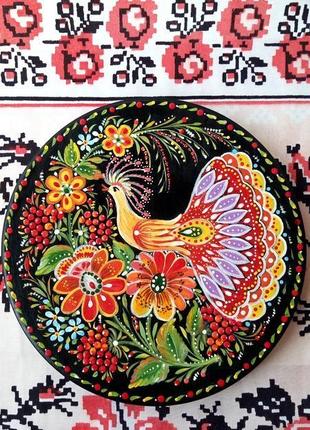 Декоративная деревянная тарелка "красная птицы" ручной роспись. петрековский роспись.