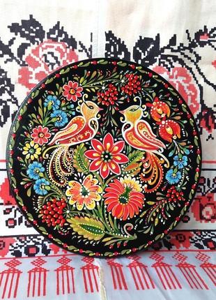 Декоративна деревянна тарілочка "дивні птахи" авторський ручний роспис. петріковський роспис.
