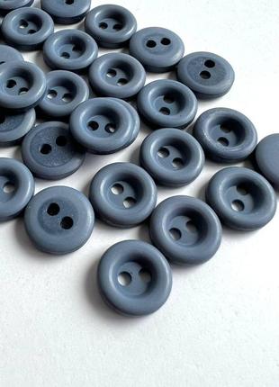Пуговица рубашечная  широкий бортик 2отв синяя 12мм пластик
