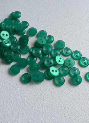 600/215 ґудзик сорочковий бортик 2отв зелений 10мм пластик